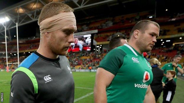 Keith Earls (left) with Jack McGrath after Ireland's defeat in Brisbane