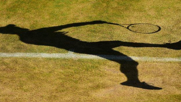 Silhouette of a tennis player