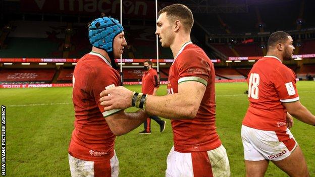 Justin Tipuric and George North celebrate winning the Triple Crown against England in February 2021