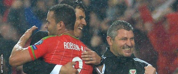 Coleman and Hal Robson-Kanu embrace after Wales beat Belgium