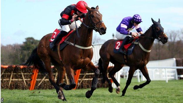 Bryony Frost rides The Knot Is Tied at Sandown Park Racecourse