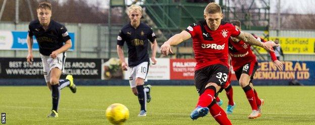 Rangers' Martyn Waghorn strikes his stoppage-time penalty