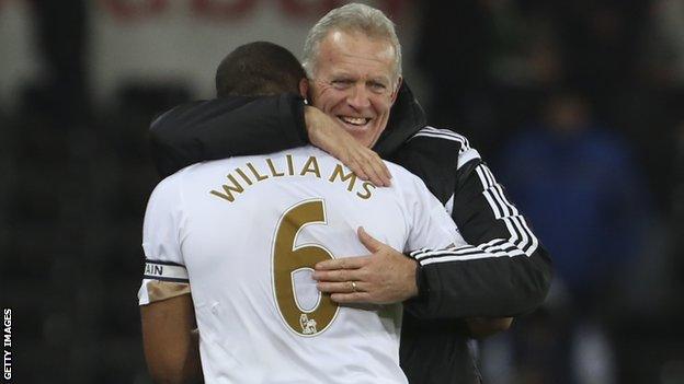 Alan Curtis hugs Ashley Williams