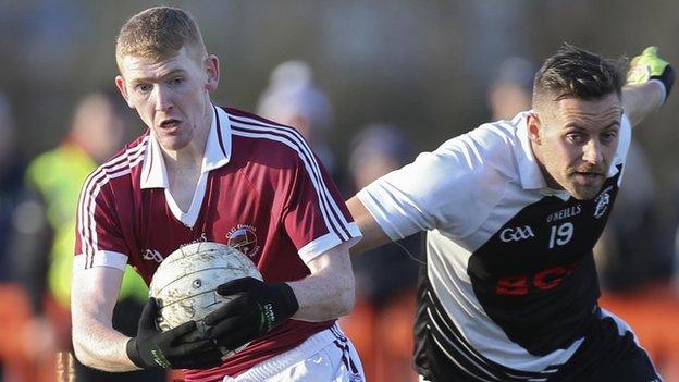 Slaughtneil goalscorer Christopher Bradley moves clear of his St Kiernan's marker