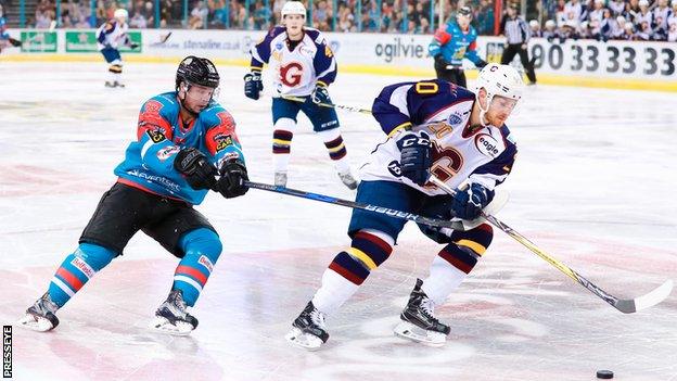 Darcy Murphy of the Belfast Giants tries to keep pace with Guildford Flames' Tomas Nechala