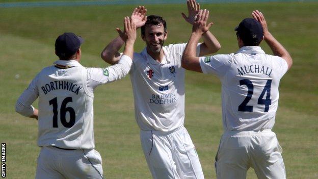 Graham Onions takes a wicket for Durham