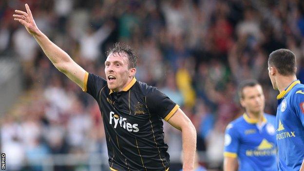 David McMillan celebrates after scoring his first goal in Tuesday's win