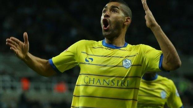 Lewis McGugan celebrates scoring for Sheffield Wednesday