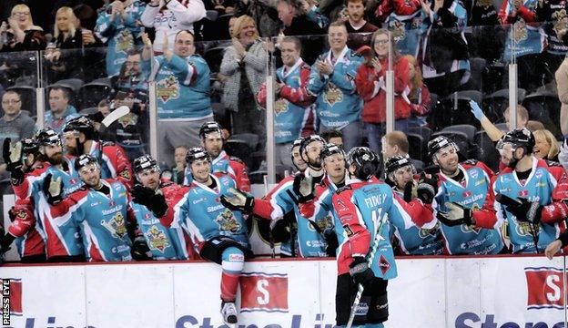 Michael Forney celebrates after scoring a penalty shot for Belfast against Coventry