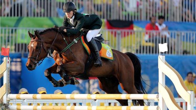 Natalya Coyle guides her horse over a fence at the Rio Games four years ago