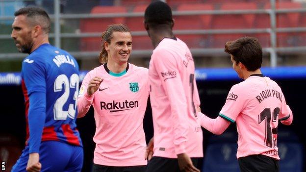 Antoine Griezmann (second from left) celebrates scoring at Eibar