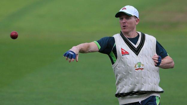 Chris Rogers throws during a net session