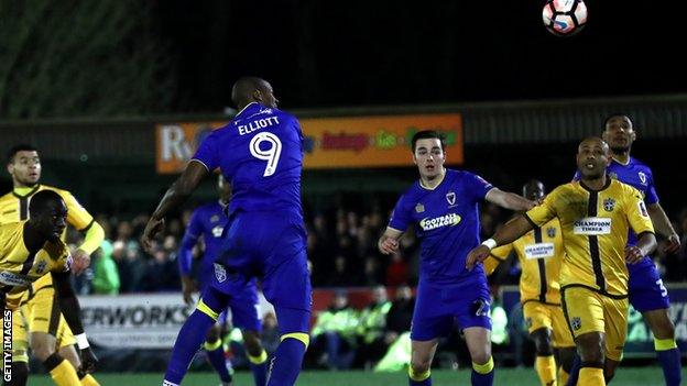 Tom Elliott scores for Wimbledon