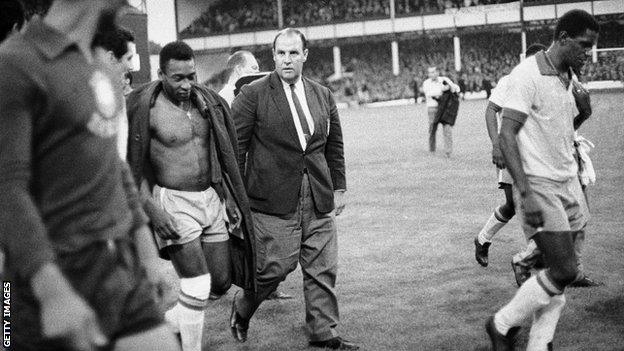 A dejected Pele leaves the field at Goodison Park after being beaten 3-1 by Portugal, 1966.