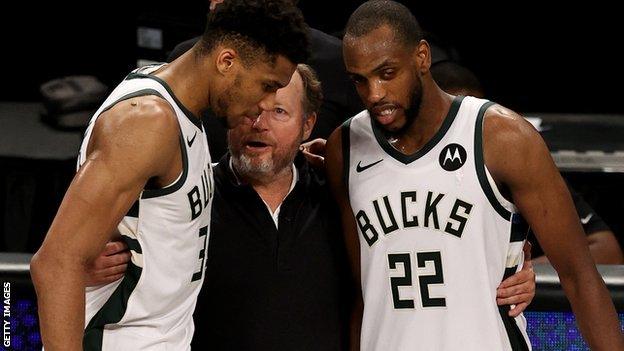 Giannis Antetokounmpo (left), Mike Budenholzer (centre) and Khris Middleton (right)