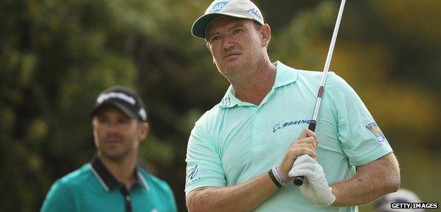 Ernie Els of South Africa hits his tee shot on the 13th hole during the first round of the BMW South African Open Championship at Glendower Golf Club