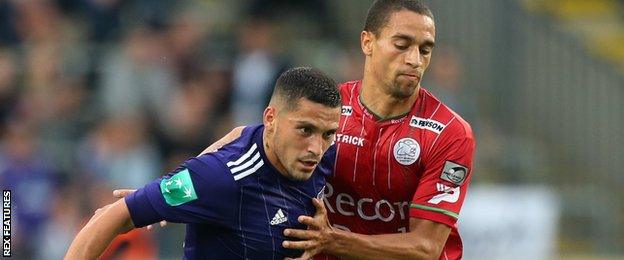 Anderlecht's Nicolae Stanciu (left) in action against Zulte Waregem