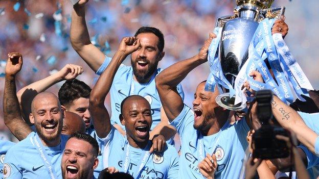 Manchester City celebrate winning the Premier League