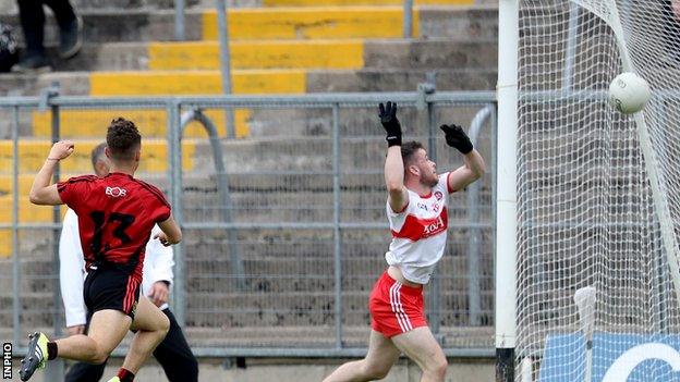 Down forward Aaron Devlin hits the Derry net in but the Oak Leafers went to to secure victory