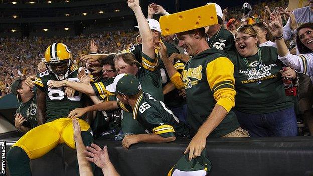 Donald Driver celebrates a touchdown at Lambeau Field