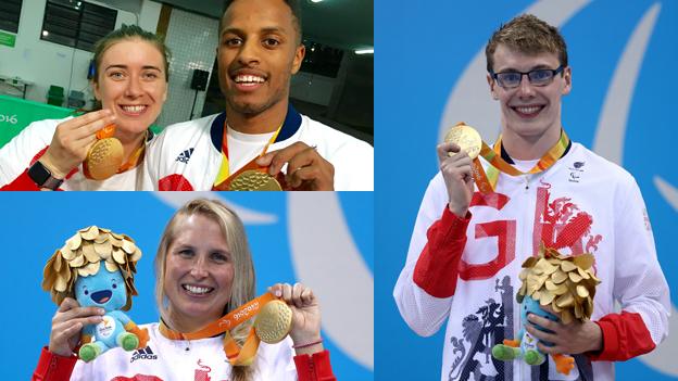 Libby Clegg, Stephanie Millward and Matt Wylie show off their gold medals after collecting them in their ceremonies