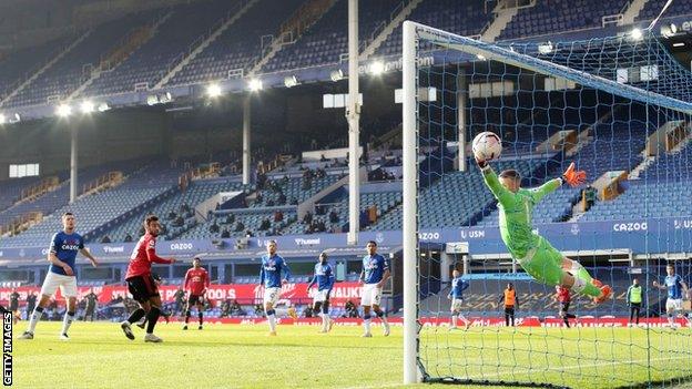 Bruno Fernandes scores with a header past Jordan Pickford