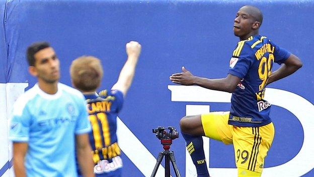 Bradley Wright-Phillips (right) celebrates scoring for New York Red Bulls in their derby win over New York City FC