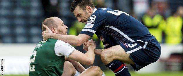 David Gray with Ross County's Paul Quinn