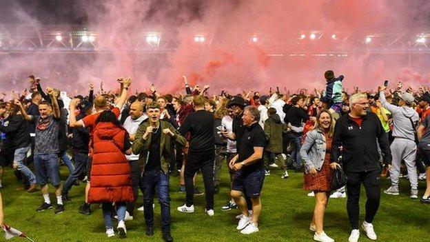 Nottingham Forest fans invade the pitch