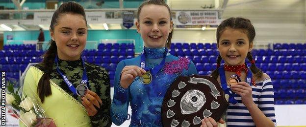 Christie Anne Shannon holds the British Championship trophy