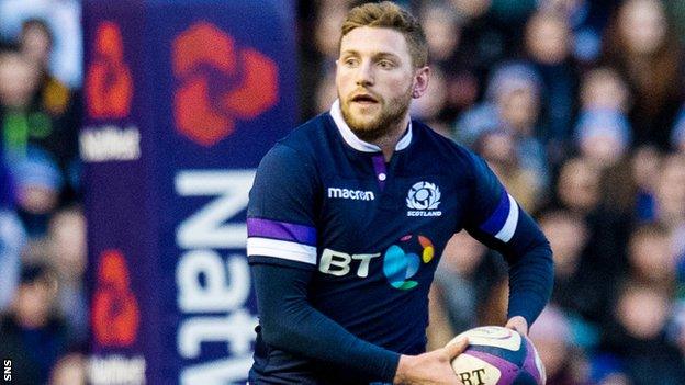 Finn Russell prepares to send out a pass for Scotland against England