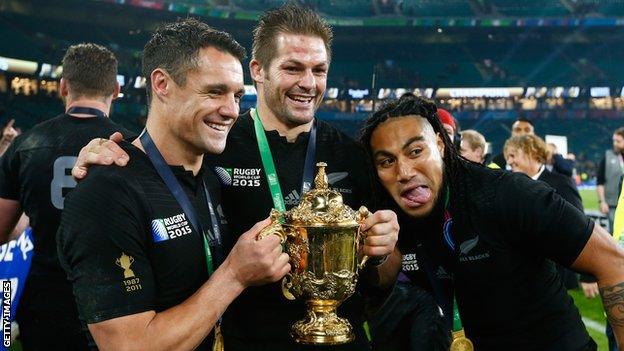 Dan Carter (left) celebrates winning the 2015 Rugby World Cup with New Zealand team-mates Richie McCaw and Ma'a Nonu