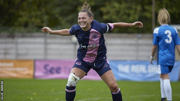 Club captain Brit Saylor celebrating during a match for Dulwich Hamlet