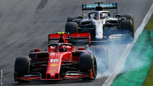 Charles Leclerc and Lewis Hamilton in action at Monza