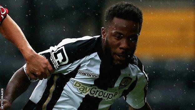 Mustapha Dumbuya playing for Notts County