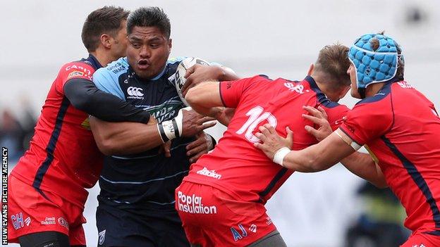 Nick Williams crashes into three Bristol defenders on his debut for Cardiff Blues