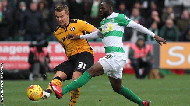 Newport County's Matt Partridge under pressure from Francois Zoko of Yeovil Town