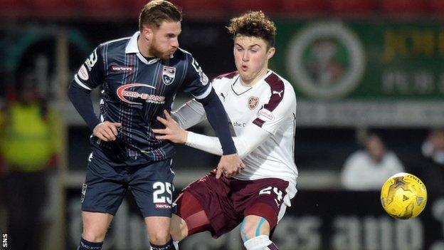 John Souttar (right) challenges David Goodwillie