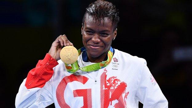 Nicola Adams holds her second Olympic boxing gold medal