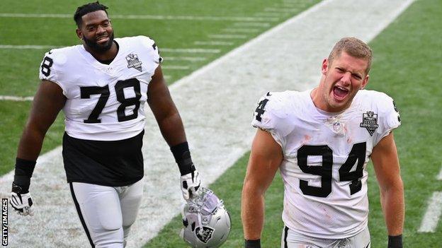 Defensive end Carl Nassib #94 and offensive guard Patrick Omameh #78 of the Las Vegas Raiders