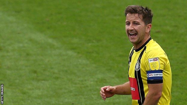 Harrogate Town captain Josh Falkingham scored the decisive penalty against Tranmere Rovers to send them through