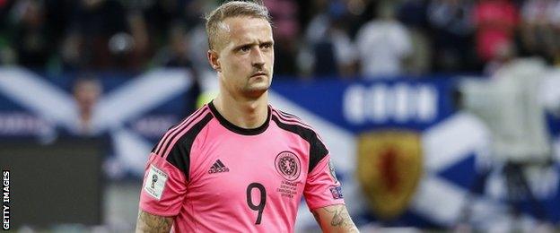 Leigh Griffiths looks dejected after Scotland's draw against Slovenia