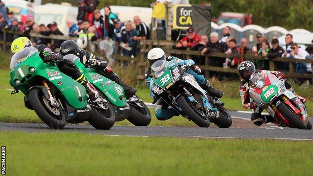 Ian Lougher leads the chasing pack during the first Supertwins race at the 2019 Ulster Grand Prix