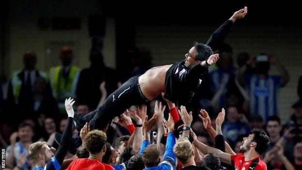 David Wagner thrown aloft by Huddersfield players