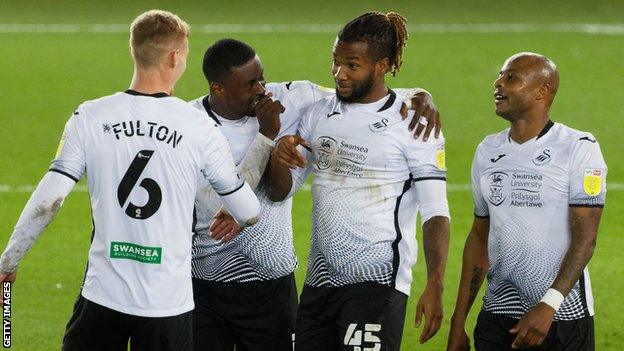 Kasey Palmer (second right) celebrates his one Swansea goal to date, which came against Stoke in October