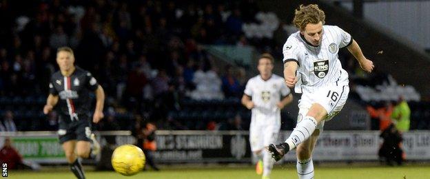 St Mirren's Tom Walsh scores their equaliser against Falkirk