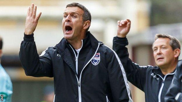 Jim McIntyre makes a point as Ross County manager, as former assistant Billy Dodds looks on