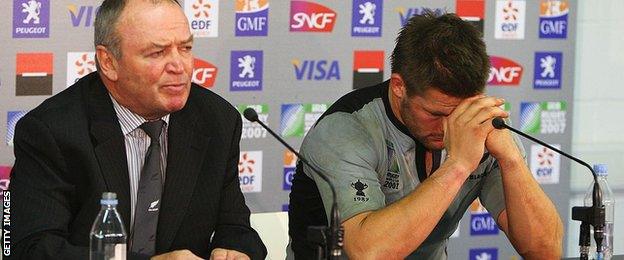 Graham Henry and captain Richie McCaw face the music after being eliminated in 2007