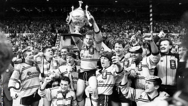 John Joyner lifts the cup for Castleford