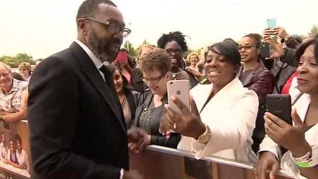 Lenny Henry meeting fans on the red carpet